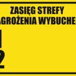 ZASIĘG STREFY ZAGROŻENIA WYBUCHEM - Tablica BHP,